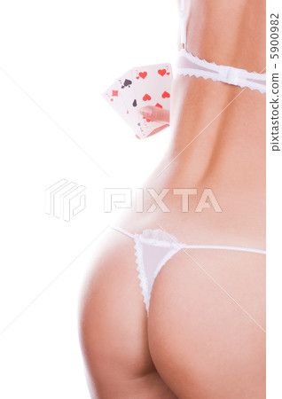 Beautiful girl holding three of a kind sevens Beautiful girl holding three of a kind sevens 5900982