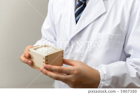 Male with white coat with white rice 5907380