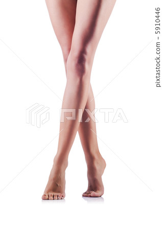 Long woman legs isolated on white 5910446