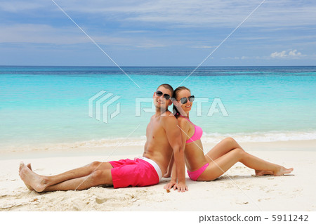 Couple on a beach 5911242