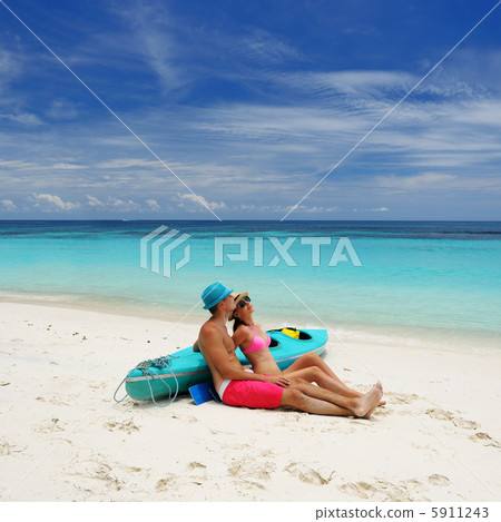 Couple on a beach 5911243