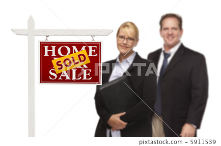 Businesswoman and Businessman Behind Real Estate Sign Isolated 5911539
