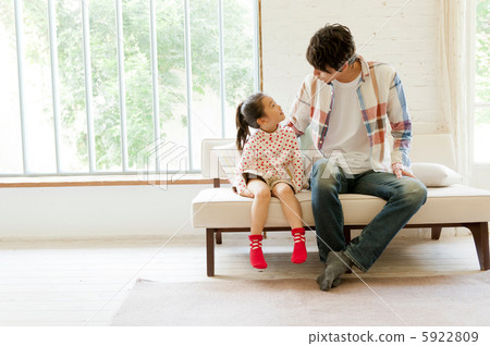 Parent and child playing in the living room Parent and child playing in the living room 5922809