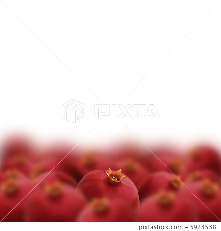 Standout, individuality, uniqueness concept. Red juicy pomegrana 5923538