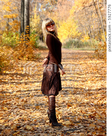 girl in autumn park girl in autumn park 5927776