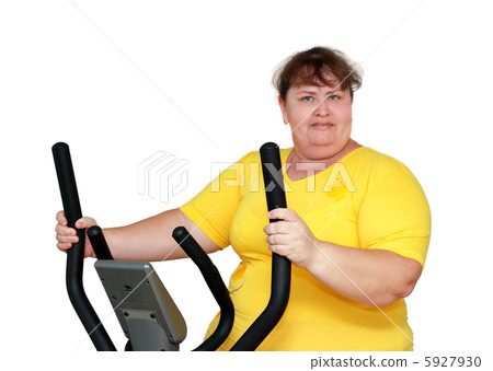 overweight woman exercising on trainer 5927930