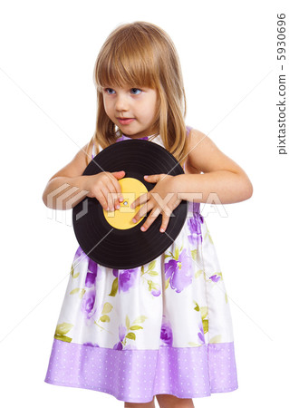 Attractive little girl holding vinyl record Attractive little girl holding vinyl record 5930696