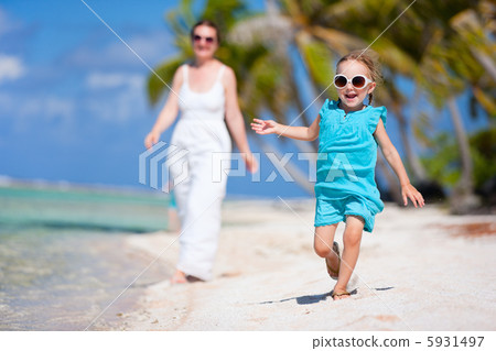 Mother and kids on a tropical vacation Mother and kids on a tropical vacation 5931497