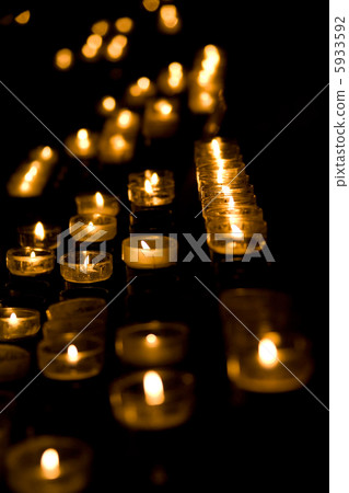 Row of burning candles 5933592