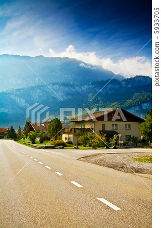 Roadway running across small alpine village Roadway running across small alpine village 5933705