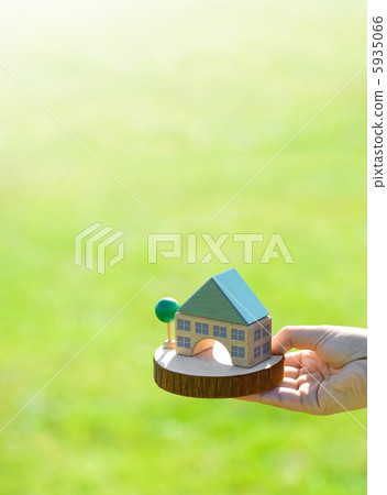 People with stacked houses 5935066