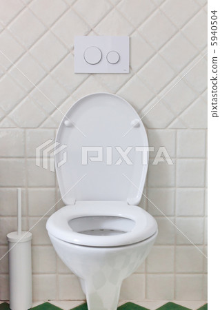 white toilet in a bathroom white toilet in a bathroom 5940504