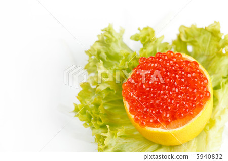 Caviar served on fresh lemon Caviar served on fresh lemon 5940832