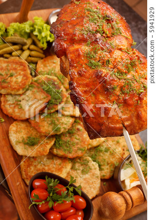 Roasted pork on the spit Roasted pork on the spit 5941929