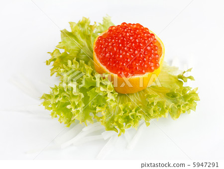 Caviar served on fresh lemon 5947291