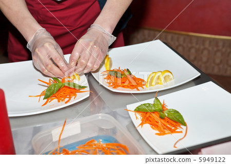 chef preparing sushi in the kitchen 5949122