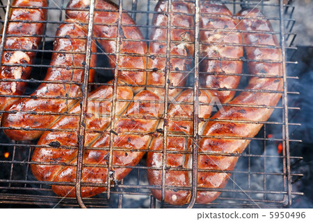 Hot sausages on barbecue Hot sausages on barbecue 5950496