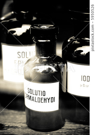 vintage chemical bottles in a pharmacy 5950526
