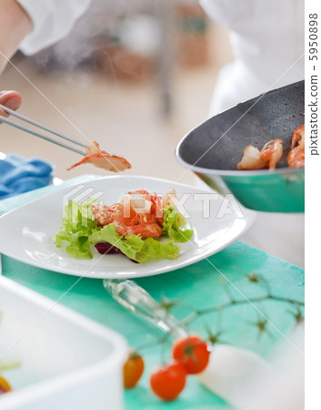 Chef preparing food Chef preparing food 5950898