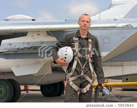 military pilot in a helmet near the aircraft 5953643