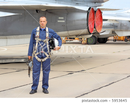military pilot in a helmet near the aircraft 5953645