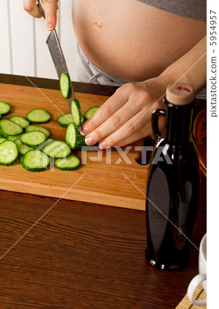 pregnant woman on kitchen pregnant woman on kitchen 5954957