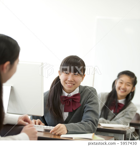 Junior high school students chatting in a PC room 5957430