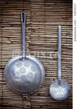 colander and skimmer as a decoration 5965037