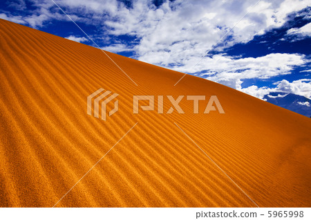 Abstract texture of sand dune in desert under sky Abstract texture of sand dune in desert under sky 5965998