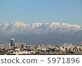Tateyama mountain range and city 5971896