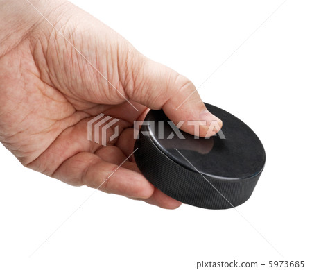 hockey puck in his hand hockey puck in his hand 5973685