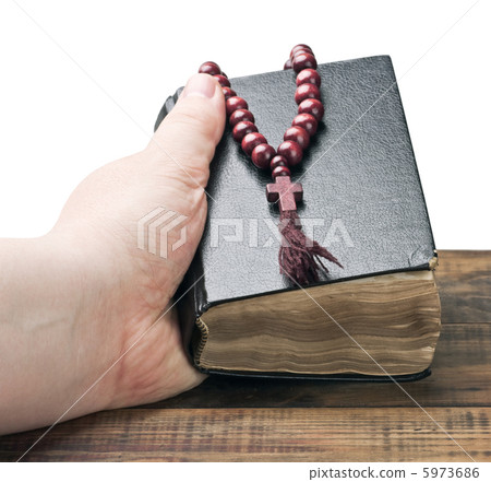 bible and wooden rosary in hand bible and wooden rosary in hand 5973686