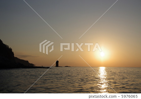 Sunset view with candle rock 5976065