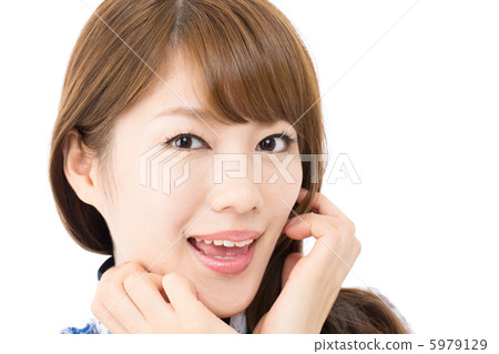 A woman in a Chinese dress A woman in a Chinese dress 5979129