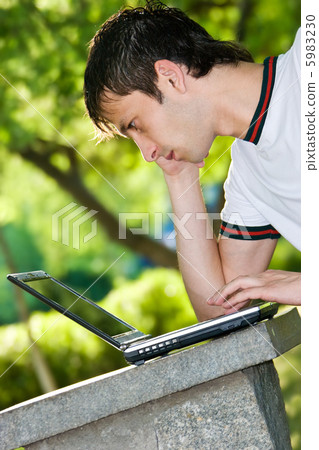 man with laptop outdoor portrait 5983230