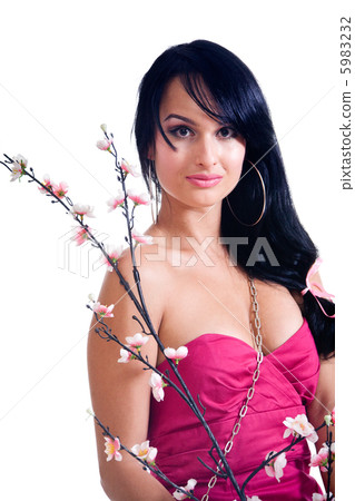 Beautiful brunette girl with blossoming sakura twig 5983232