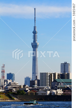 Tugboat and Tokyo Sky Tree sailing the Sumida river spreading blue sky to the downstream Tugboat and Tokyo Sky Tree sailing the Sumida river spreading blue sky to the downstream 5985467