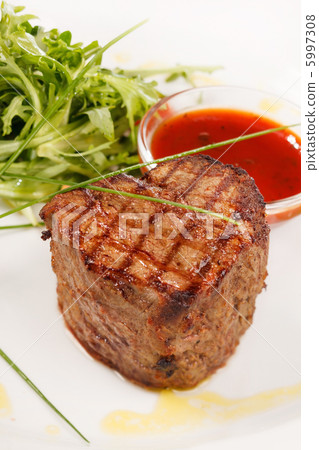 Grilled steak with sauce Grilled steak with sauce 5997308