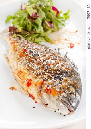 fried fish with fresh herbs and lemon fried fish with fresh herbs and lemon 5997483