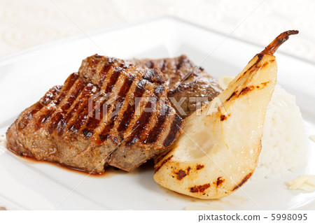 Grilled pork steak with pear Grilled pork steak with pear 5998095