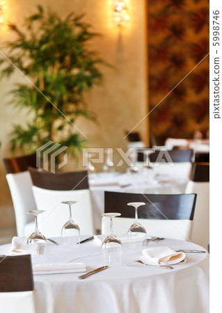 Tables set for meal Tables set for meal 5998746