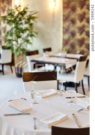 Tables set for meal 5999142