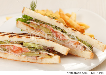 Sandwiches with French fried potatoes Sandwiches with French fried potatoes 6002498
