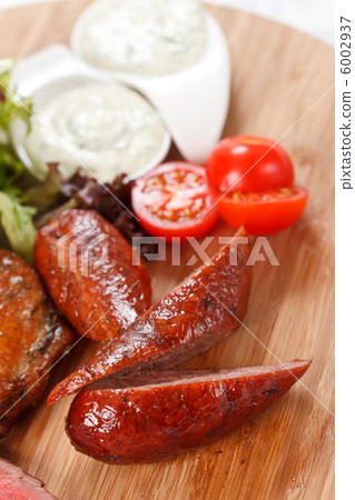 sausages on a wooden cutting board 6002937