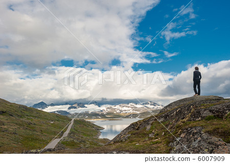 Silhouette of traveler at Scenic 55 road, Norway Silhouette of traveler at Scenic 55 road, Norway 6007909