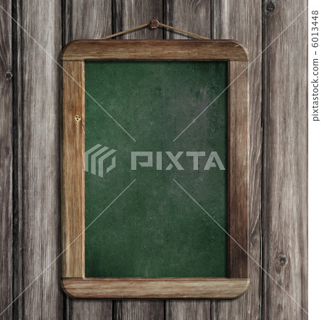 Aged green menu blackboard hanging on wooden wall Aged green menu blackboard hanging on wooden wall 6013448
