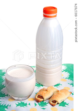 Plastic bottle with clabber, glass and bagels Plastic bottle with clabber, glass and bagels 6017874