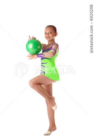 Happy girl stand with green gymnastic ball Happy girl stand with green gymnastic ball 6020206