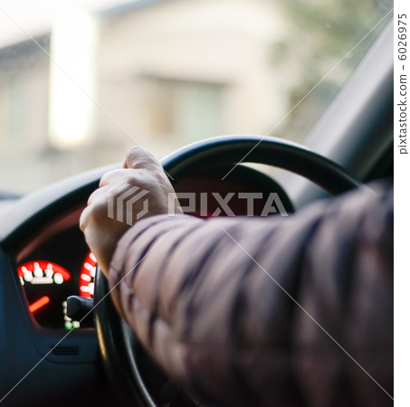 A woman driving a car A woman driving a car 6026975