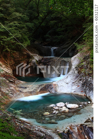 Nanatsugama Godan Waterfall in Nishizawa Valley Nanatsugama Godan Waterfall in Nishizawa Valley 6032117